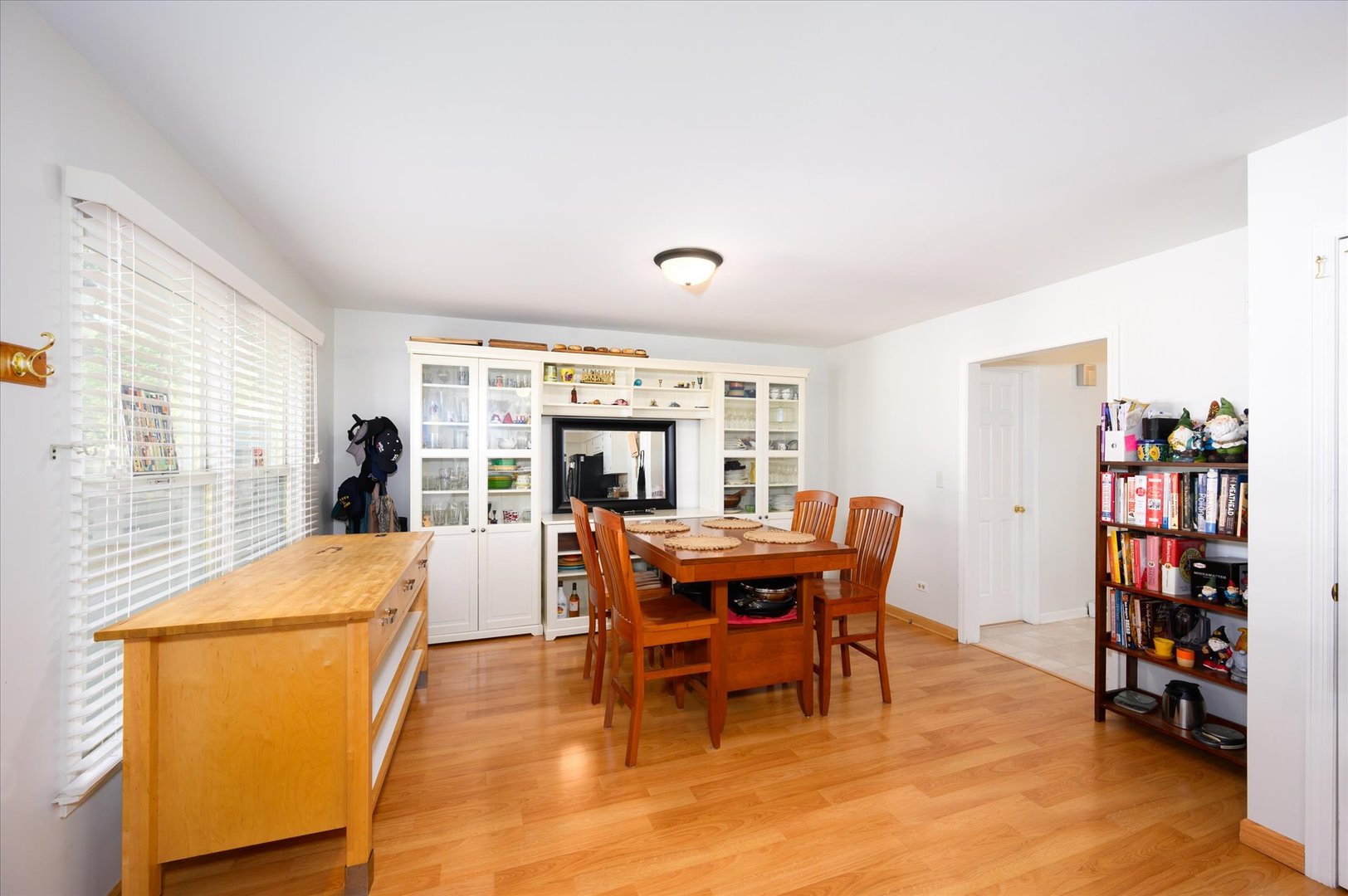 1709 Kay Road Wheaton, IL 60187 - Photo 13 of 37 a dining room with furniture and wooden floor