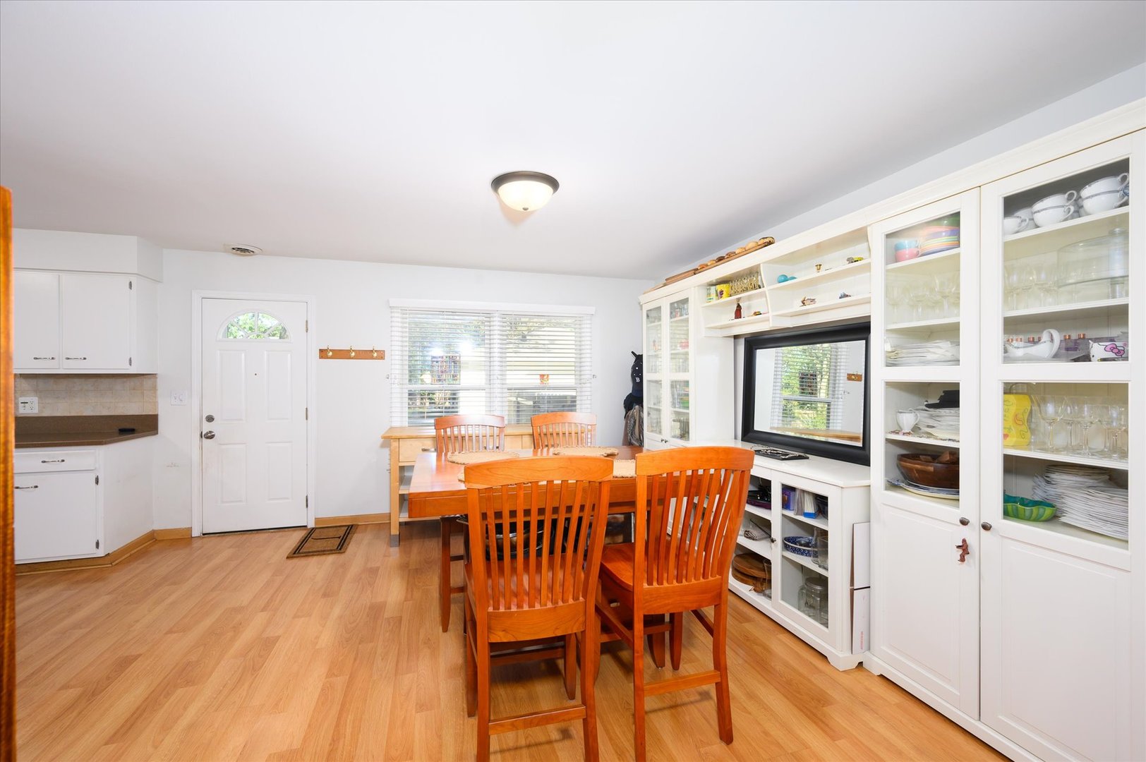 1709 Kay Road Wheaton, IL 60187 - Photo 14 of 37 a dining room with furniture and wooden floor