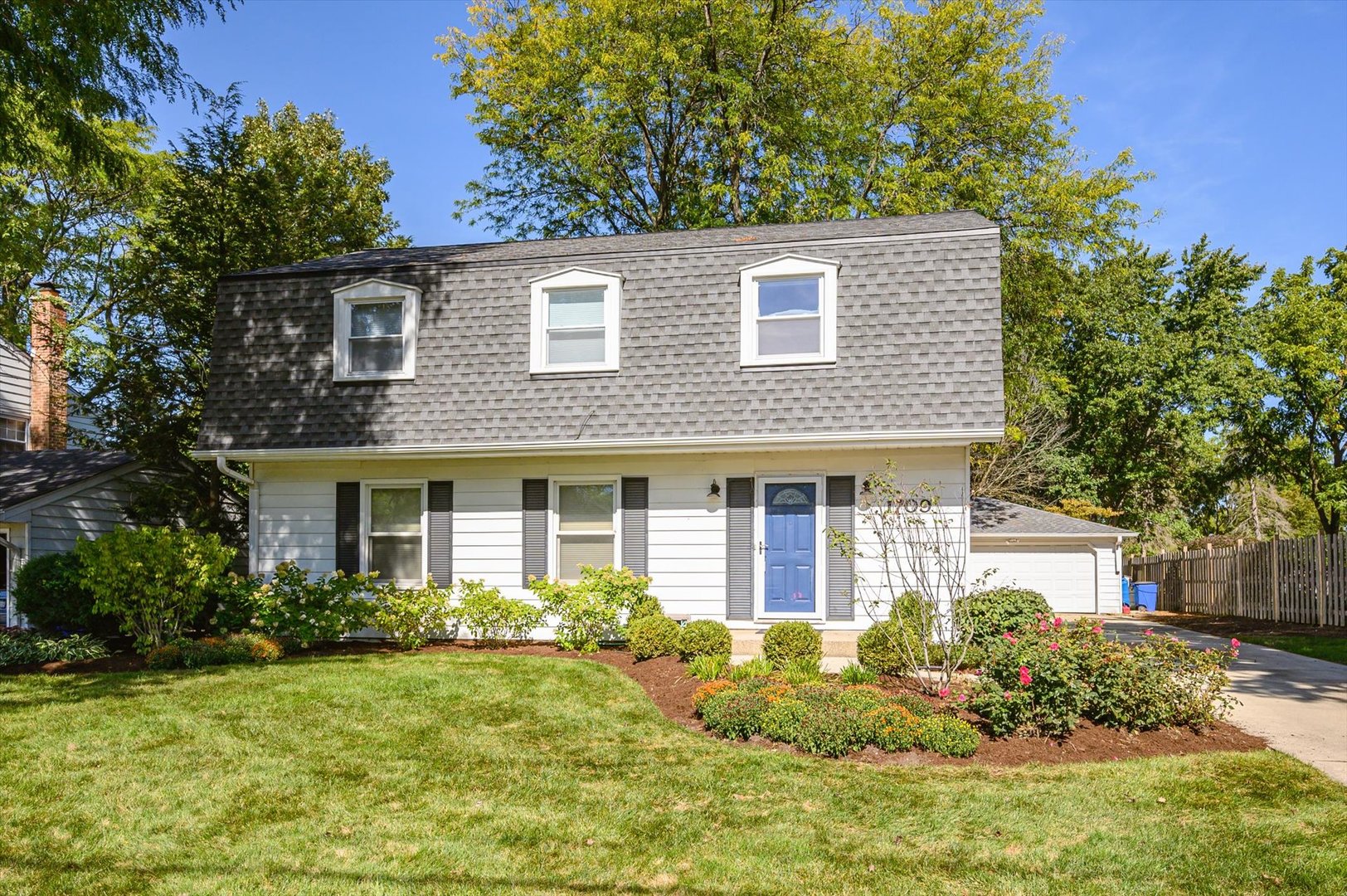 1709 Kay Road Wheaton, IL 60187 - Photo 2 of 37 a house that has a lot of plants in it