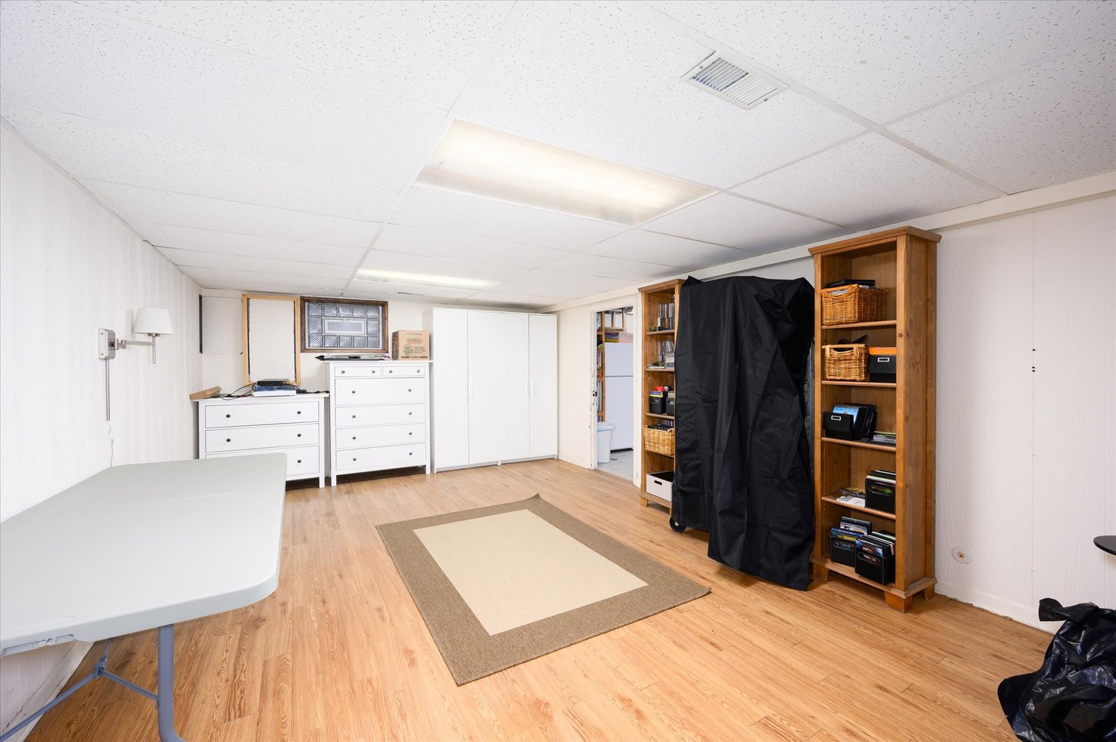 1709 Kay Road Wheaton, IL 60187 - Photo 27 of 37 a bed room with a bed and cabinets