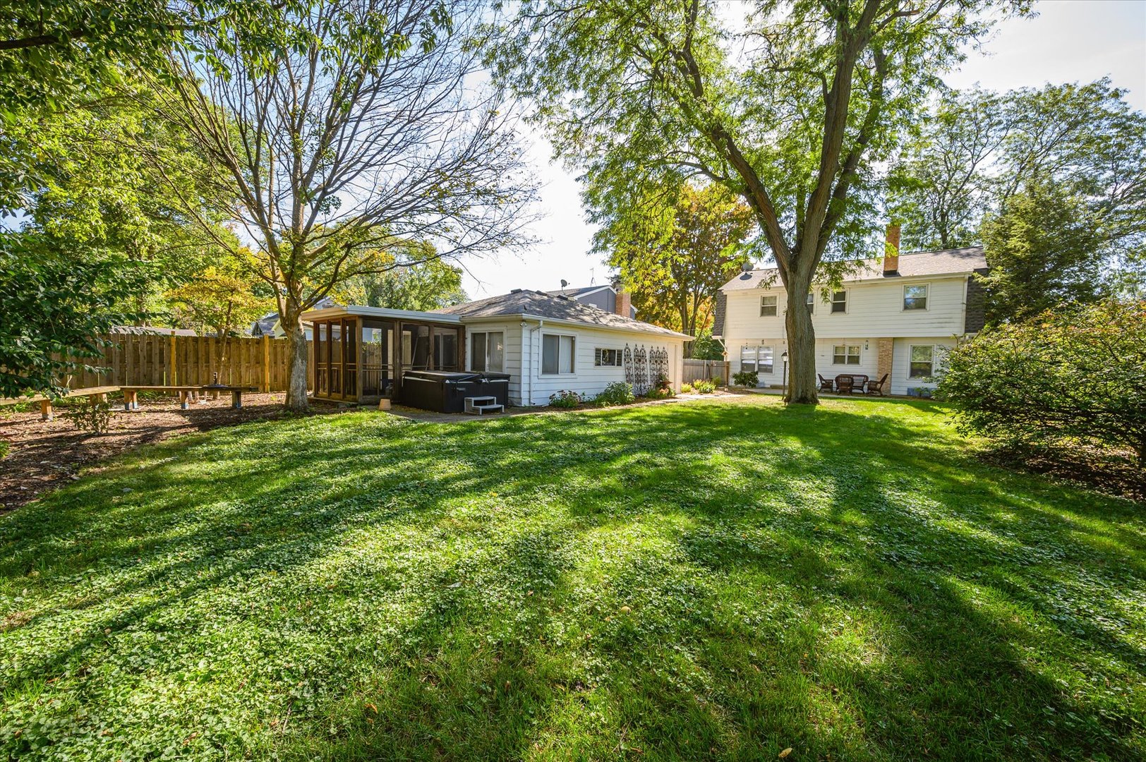 1709 Kay Road Wheaton, IL 60187 - Photo 29 of 37 a view of a house with a big yard and large trees