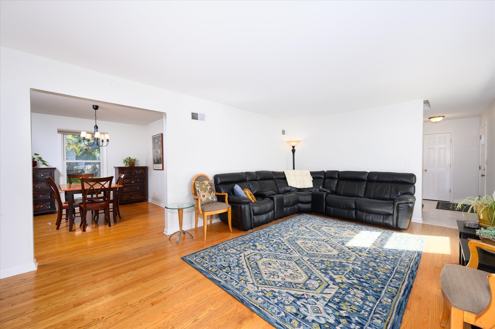 1709 Kay Road Wheaton, IL 60187 - Photo 6 of 37 a living room with furniture and a wooden floor