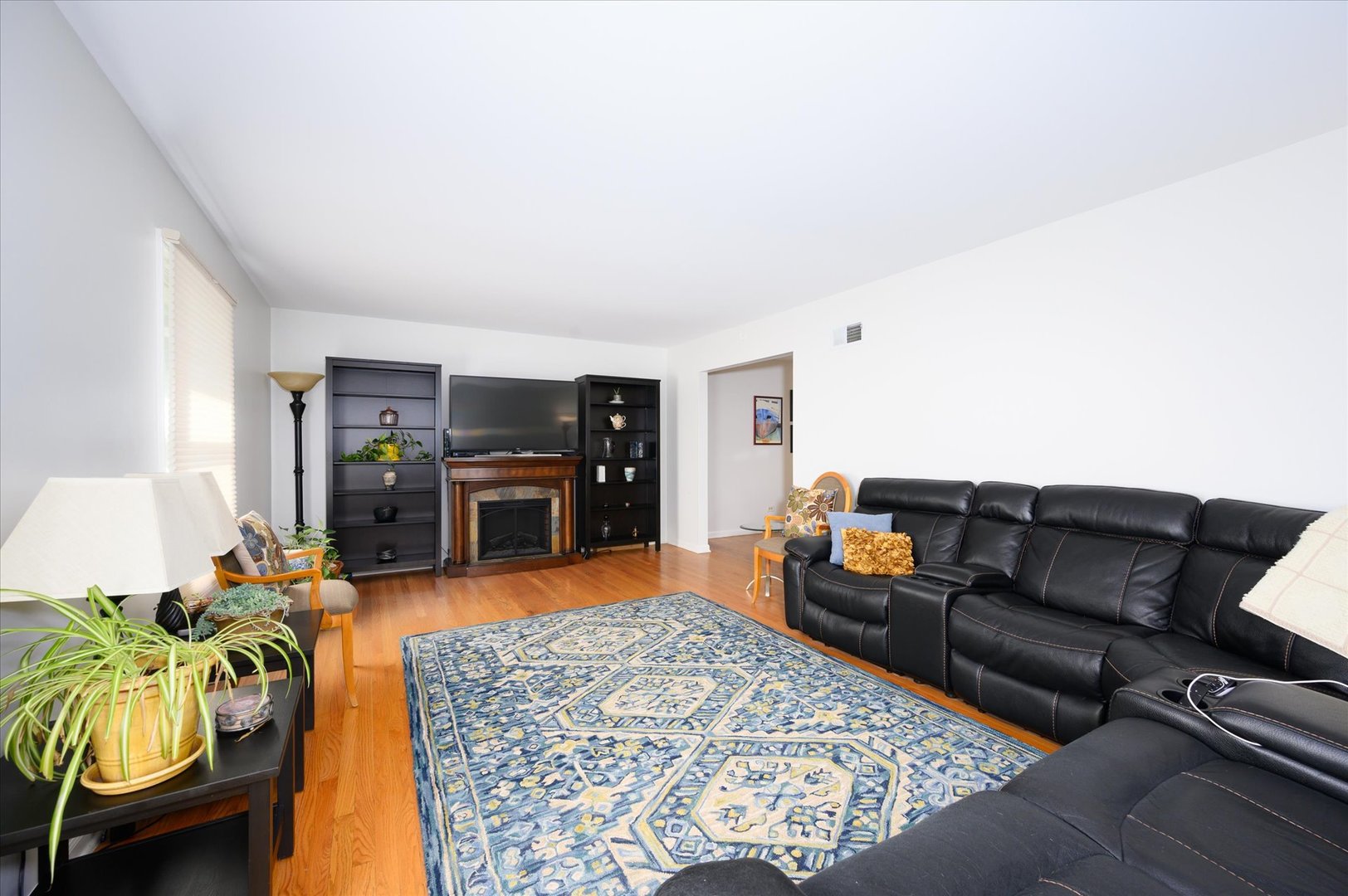 1709 Kay Road Wheaton, IL 60187 - Photo 7 of 37 a living room with furniture and a flat screen tv
