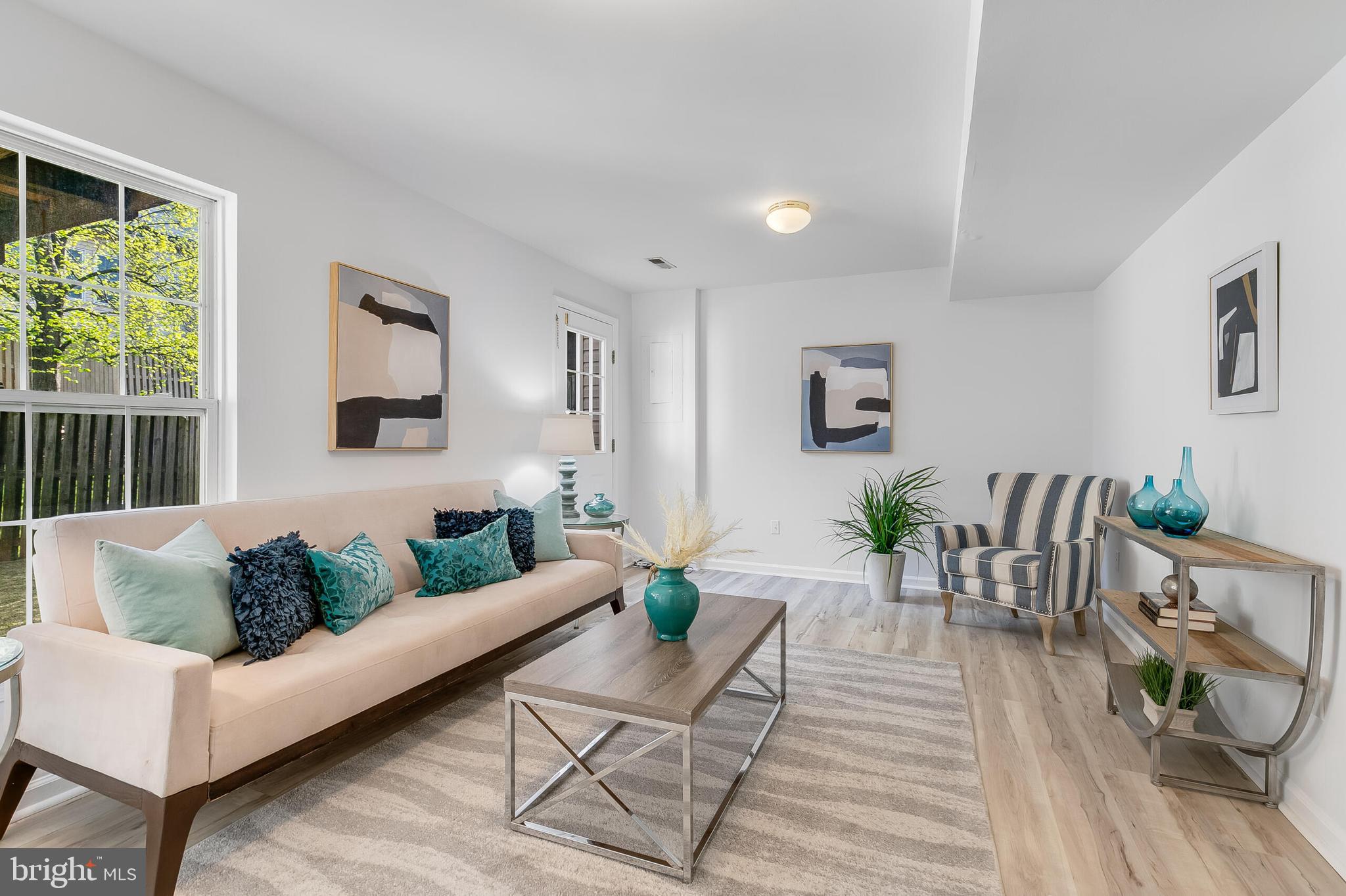 46716 Cavendish Square Sterling, VA 20165 - Photo 30 of 42 a living room with furniture and wooden floor