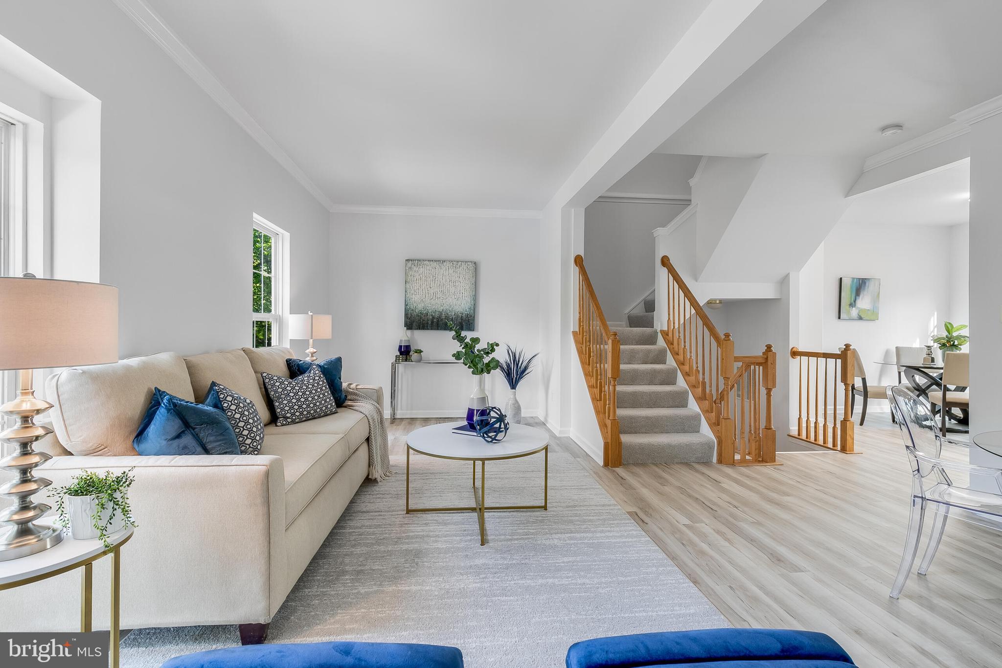 46716 Cavendish Square Sterling, VA 20165 - Photo 5 of 42 a living room with furniture and wooden floor