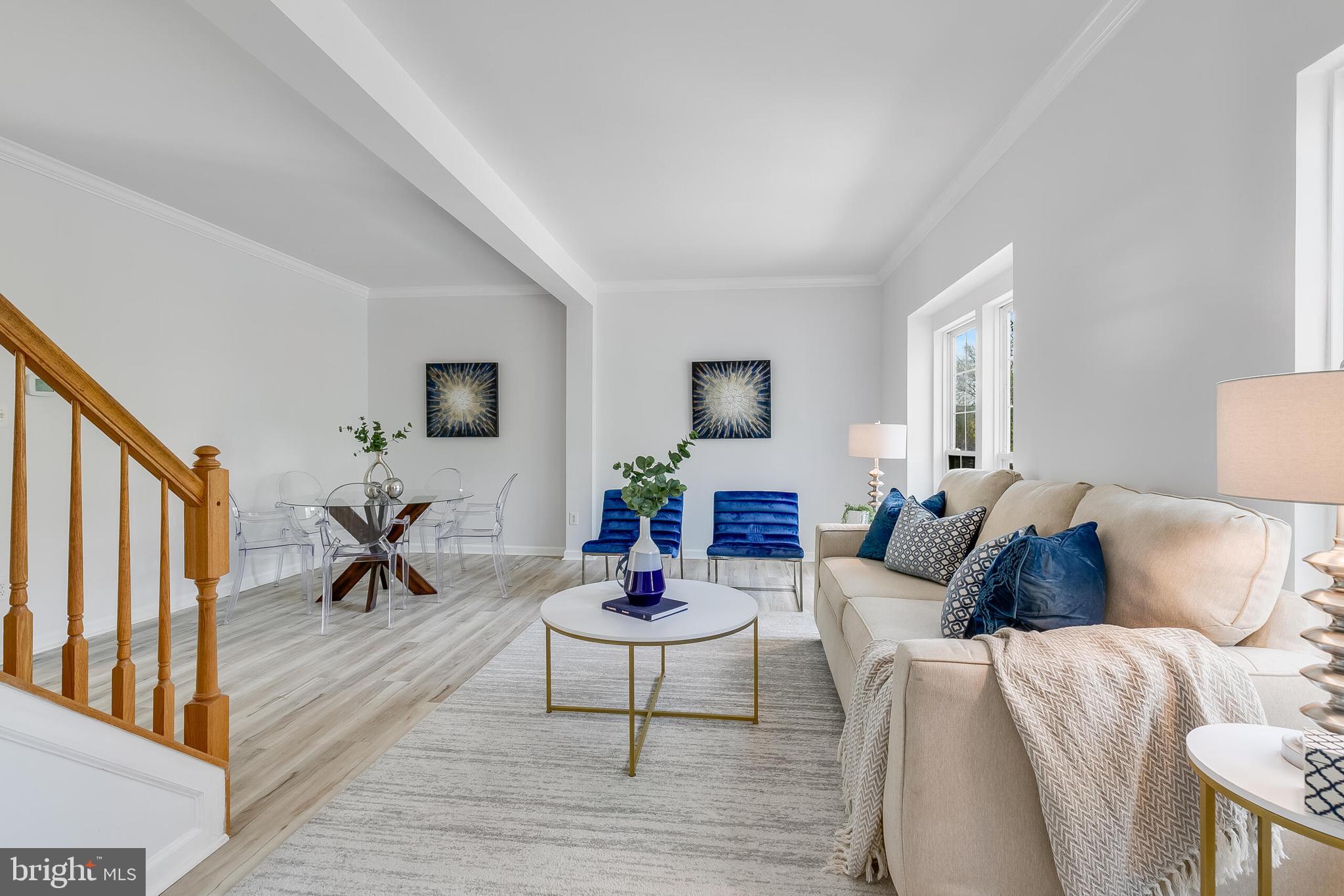 46716 Cavendish Square Sterling, VA 20165 - Photo 7 of 42 a living room with furniture a rug and a table