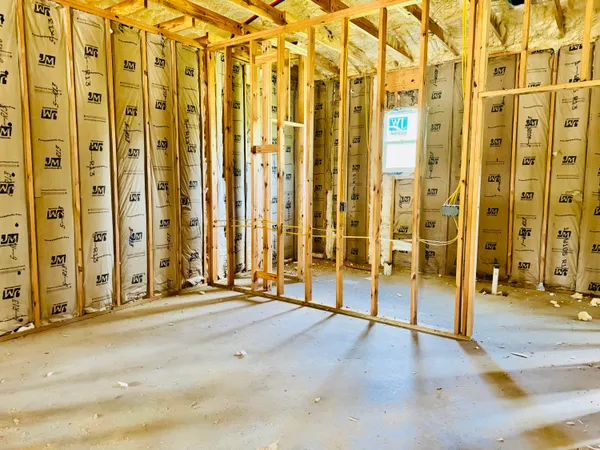 a view of a room with wooden walls