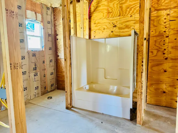 a view of a entryway door with wooden floor