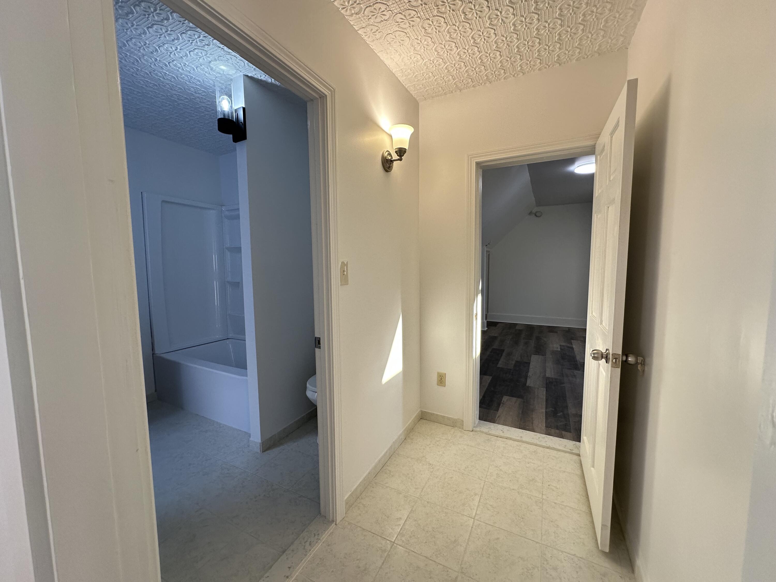 43 Maple Street Dexter, ME 04930 - Photo 34 of 63 hallway to 3rd bedroom