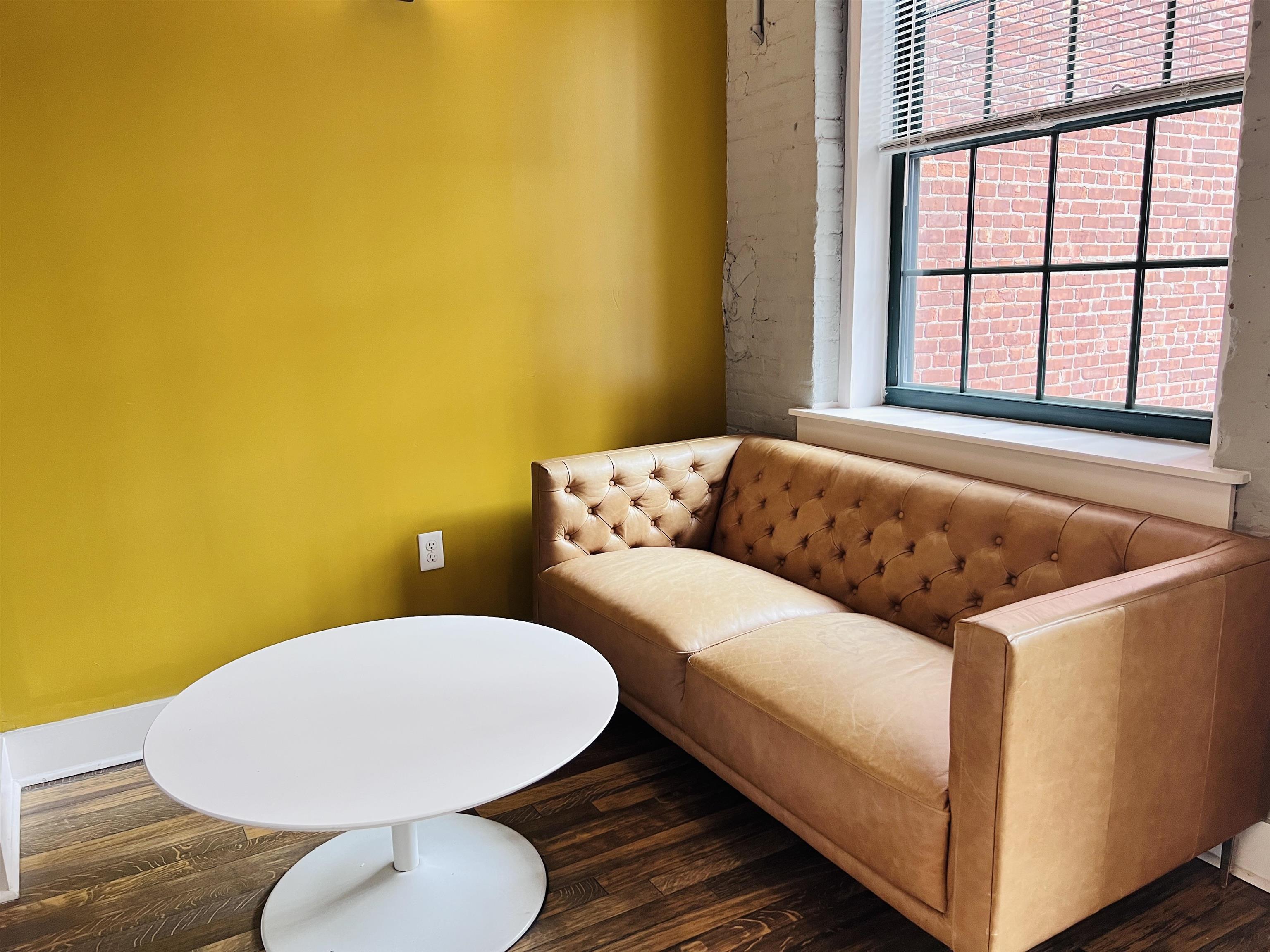 160 Lafayette Street, Unit 52207 Jersey City, NJ 07304 - Photo 22 of 25 a living room with furniture and a large window