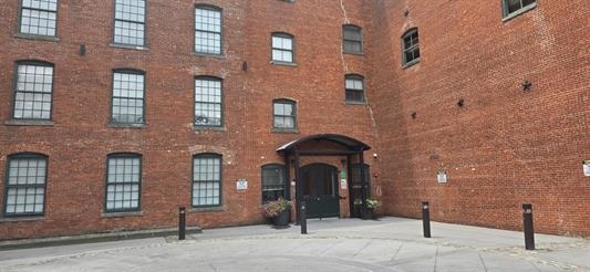 160 Lafayette Street, Unit 52207 Jersey City, NJ 07304 - Photo 25 of 25 a front view of a brick building with many windows