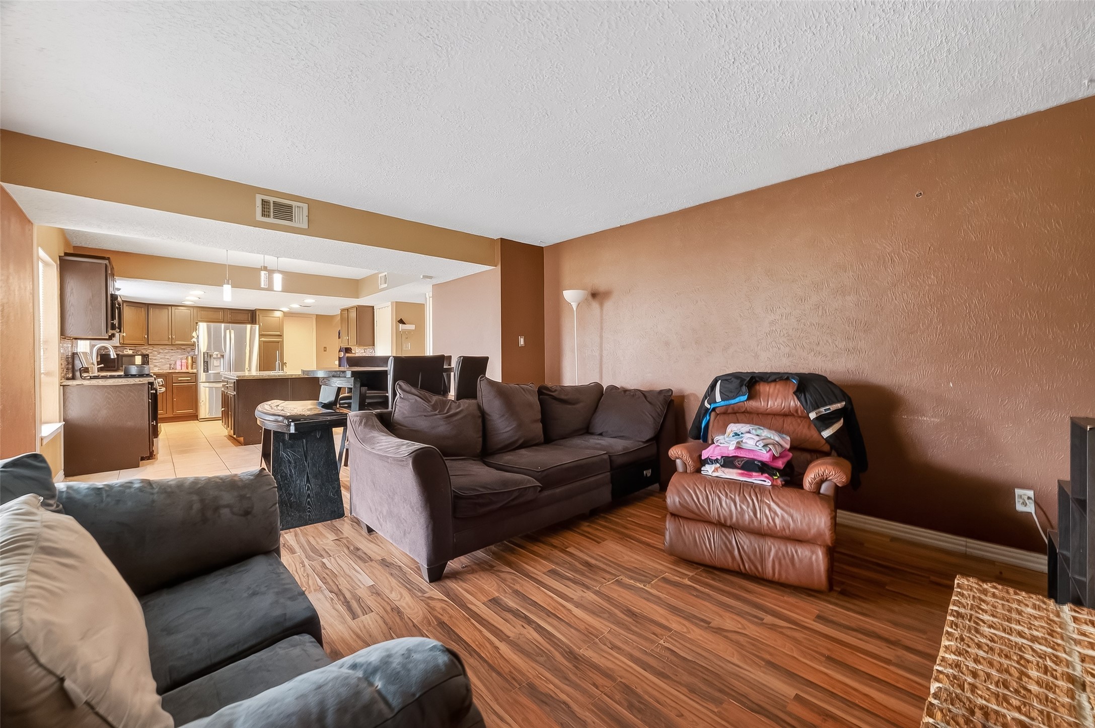 16006 El Toro Court Webster, TX 77598 - Photo 13 of 19 a living room with furniture and a wooden floor