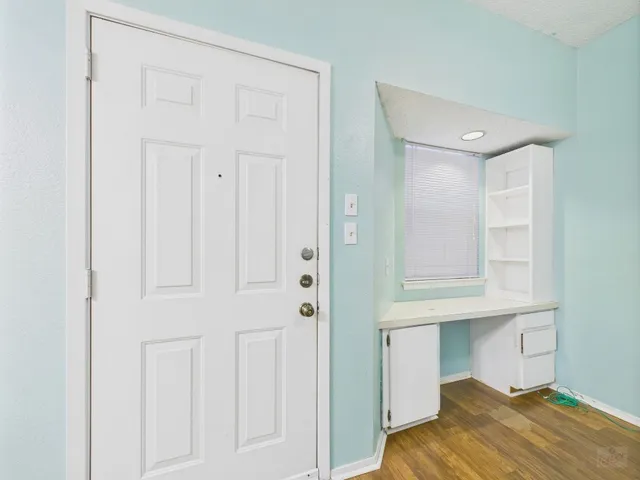 a view of bedroom with furniture
