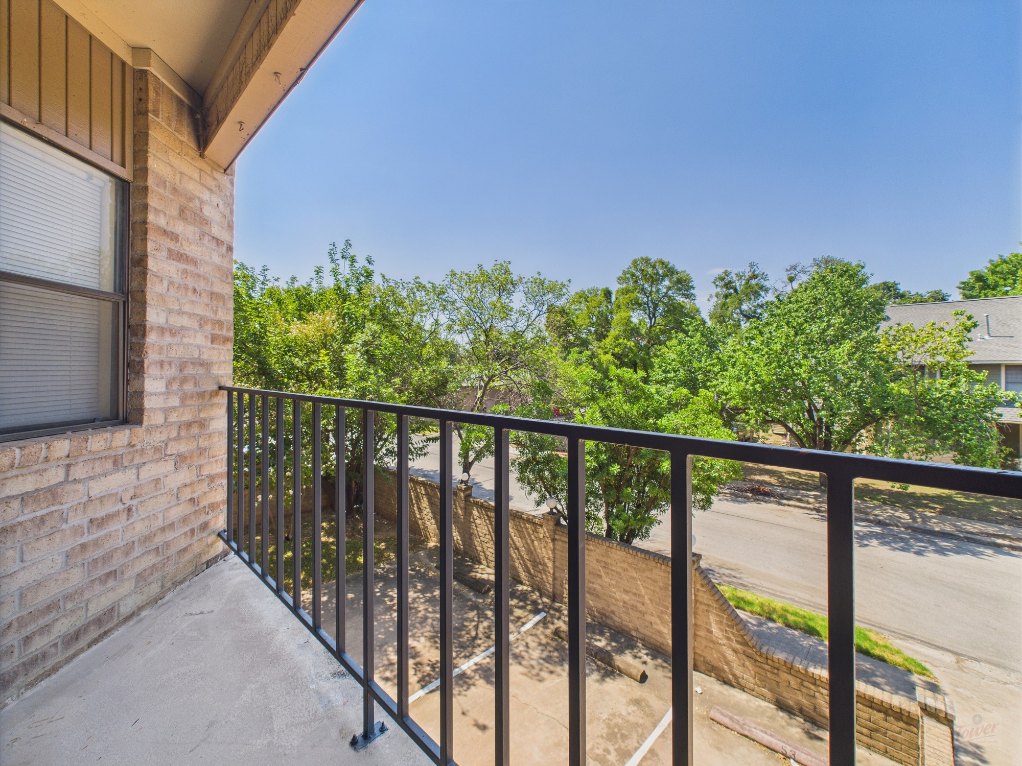 3316 Guadalupe Street, Unit 220 Austin, TX 78705 - Photo 13 of 14 a balcony with street view