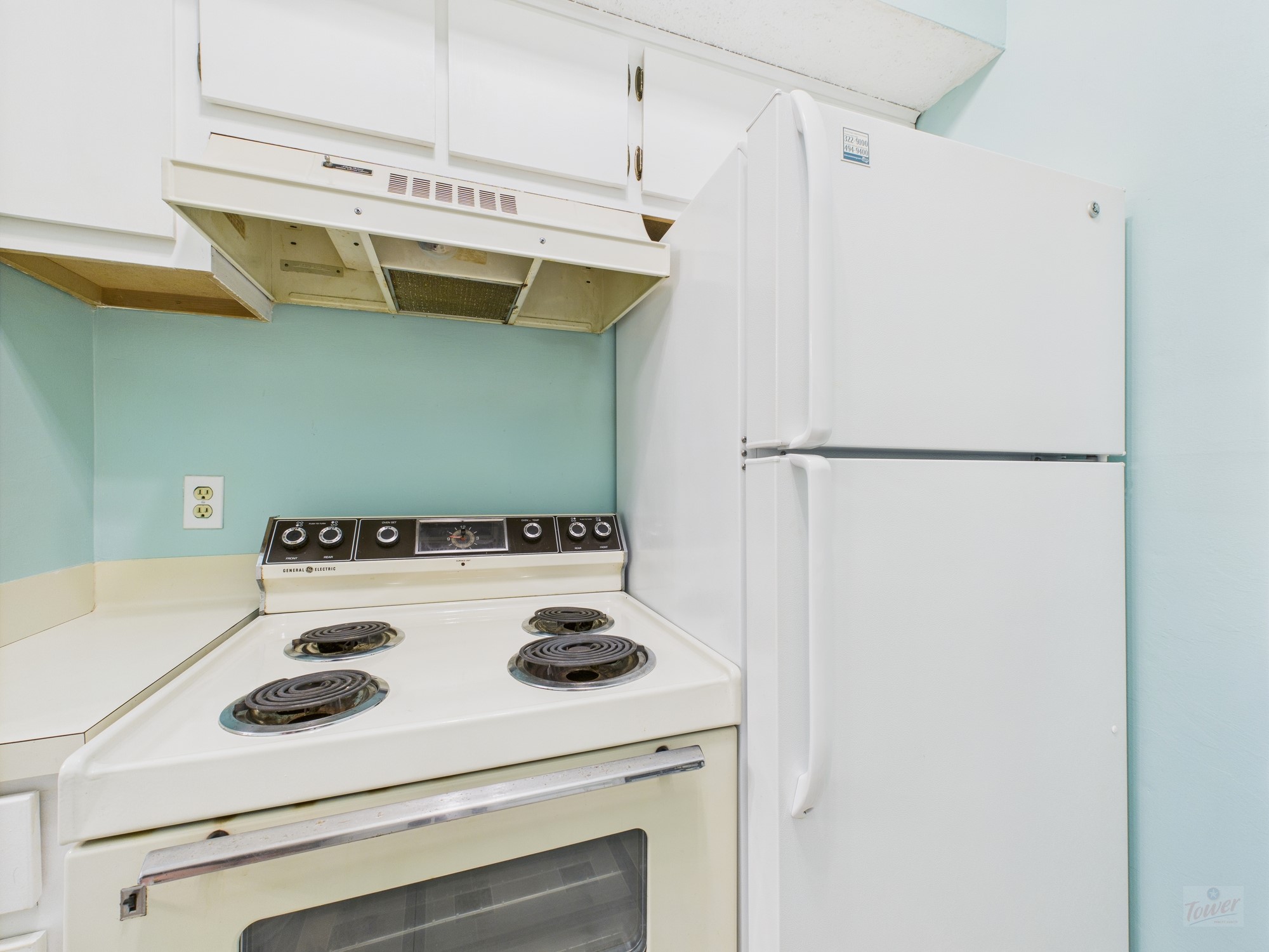 3316 Guadalupe Street, Unit 220 Austin, TX 78705 - Photo 6 of 14 a kitchen with a refrigerator and white stove