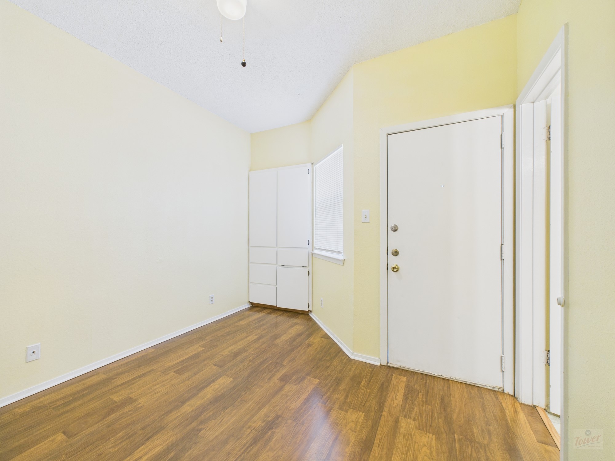 3316 Guadalupe Street, Unit 220 Austin, TX 78705 - Photo 9 of 14 a view of empty room with wooden floor