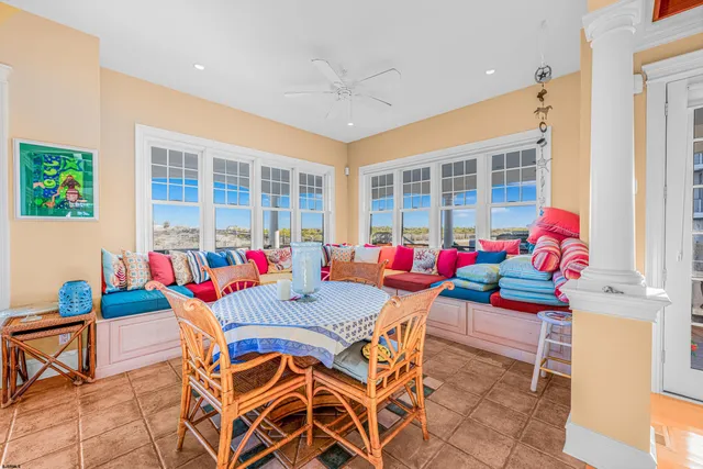 a dining room with furniture window wooden floor