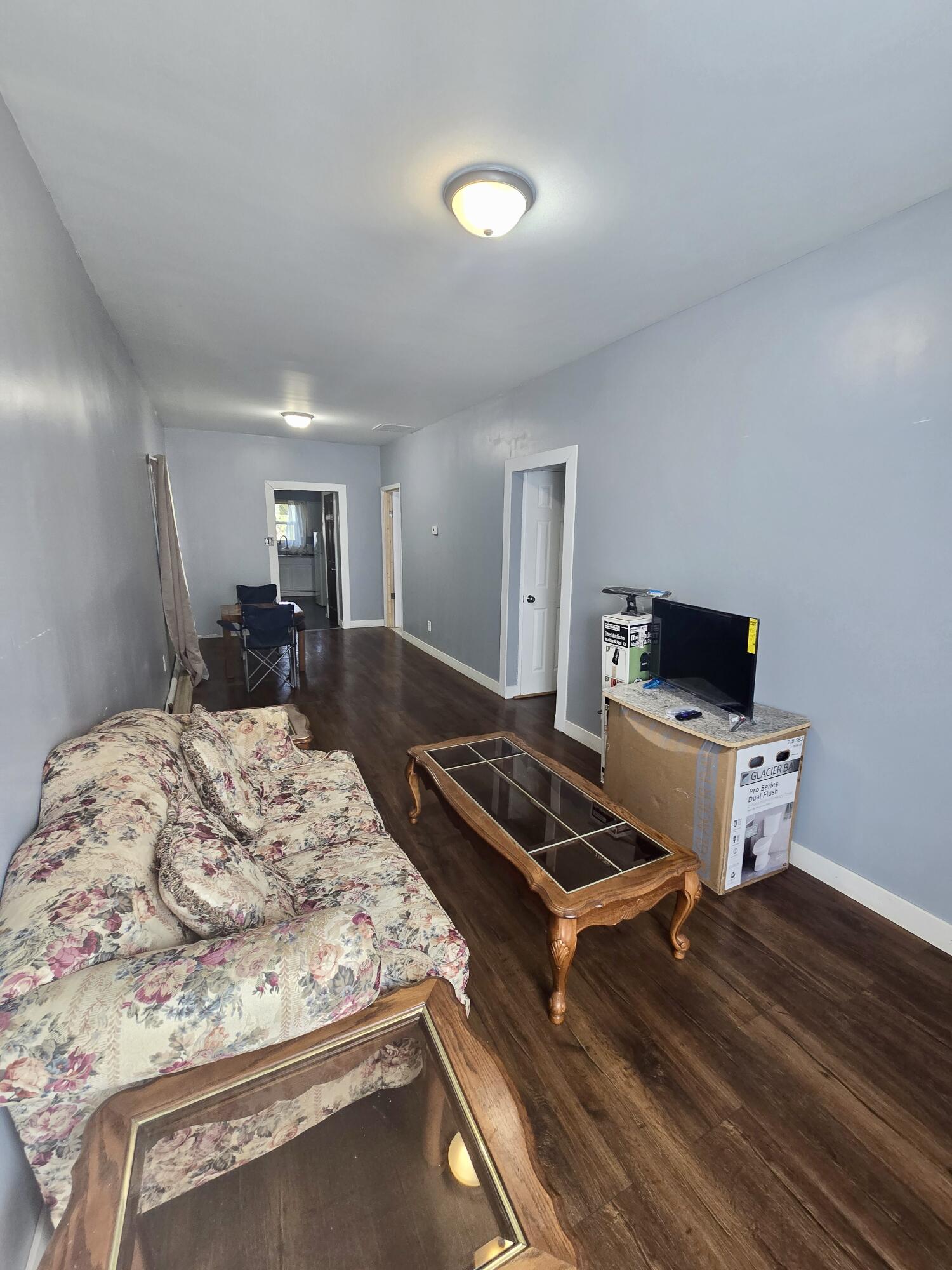 4613 Maryland Street Gary, IN 46409 - Photo 3 of 24 a living room with furniture and a flat screen tv