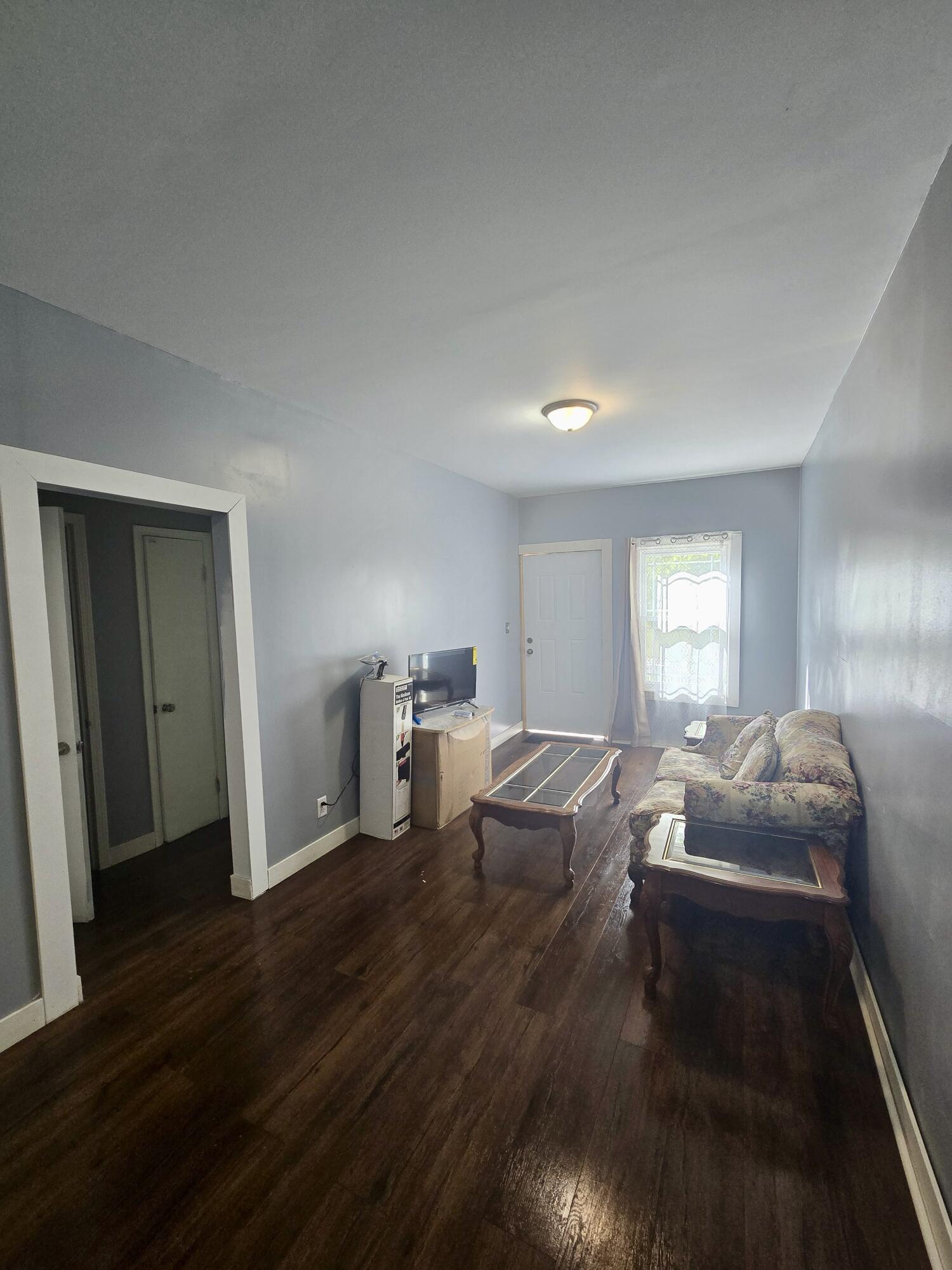 4613 Maryland Street Gary, IN 46409 - Photo 5 of 24 a living room with furniture and a wooden floor