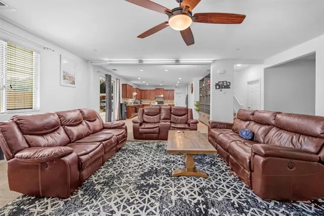a kitchen with stainless steel appliances a refrigerator and a sink