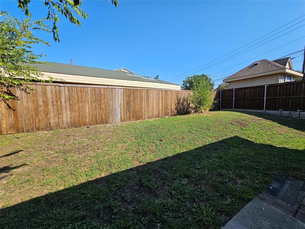 17406 Energy Lane Dallas, TX 75252 - Photo 15 of 15 a view of a backyard with potted plants