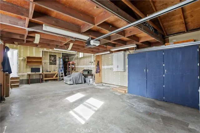 a view of the room with gym equipment