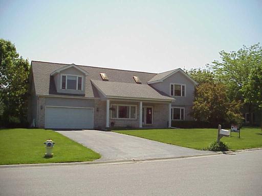1012 Charles Street Crete, IL 60417 - Photo 1 of 1 a front view of house with yard and green space