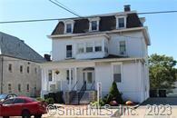 32 Huntington Street, Unit 2B New London, CT 06320 - Photo 1 of 1 a front view of a house with parking