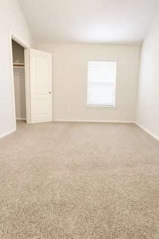 a view of an empty walk in closet