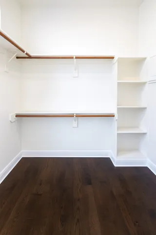 a bathroom with a bathtub a sink and a mirror