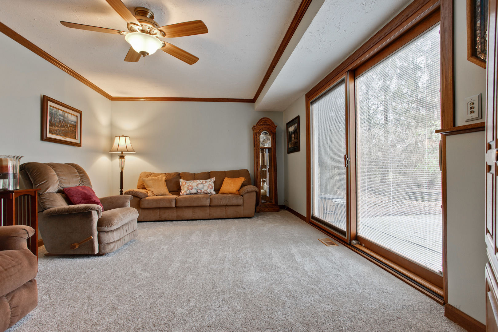 820 Freeman Road Hoffman Estates, IL 60192 - Photo 13 of 33 a living room with furniture and a window