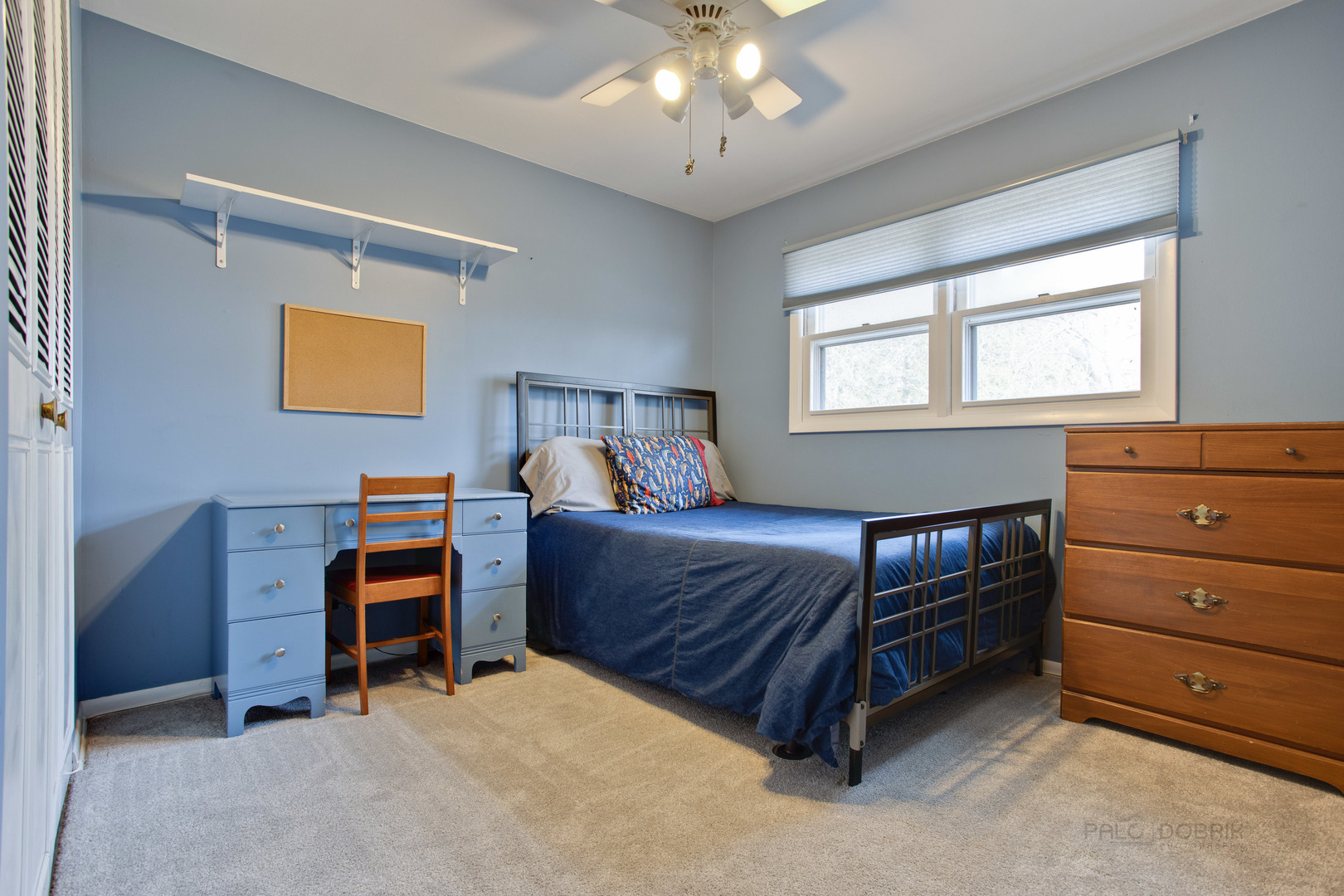 820 Freeman Road Hoffman Estates, IL 60192 - Photo 21 of 33 a bedroom with a bed and a dresser