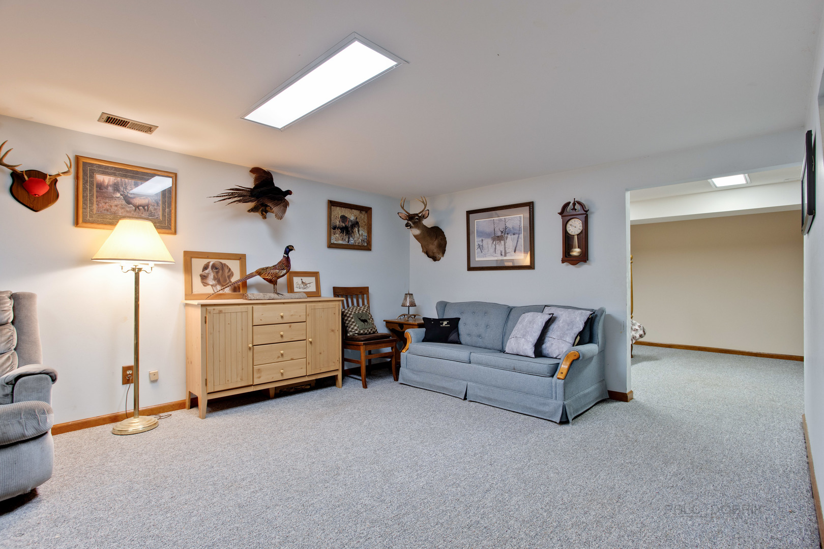 820 Freeman Road Hoffman Estates, IL 60192 - Photo 26 of 33 a living room with furniture and a baby crib