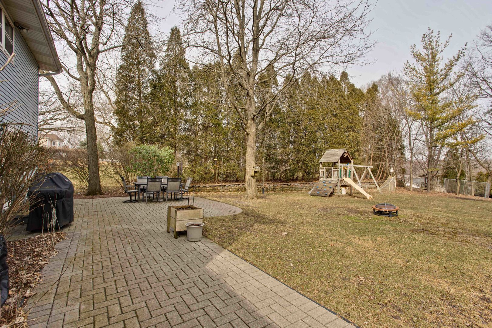820 Freeman Road Hoffman Estates, IL 60192 - Photo 28 of 33 a view of a park with swings and slides