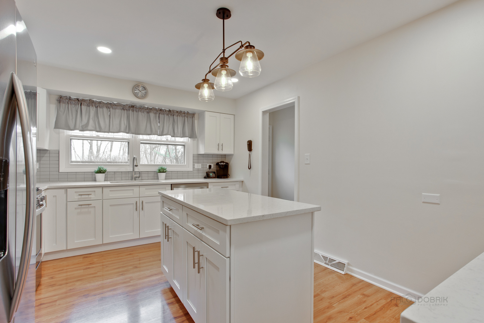 820 Freeman Road Hoffman Estates, IL 60192 - Photo 4 of 33 a kitchen with a sink cabinets and window