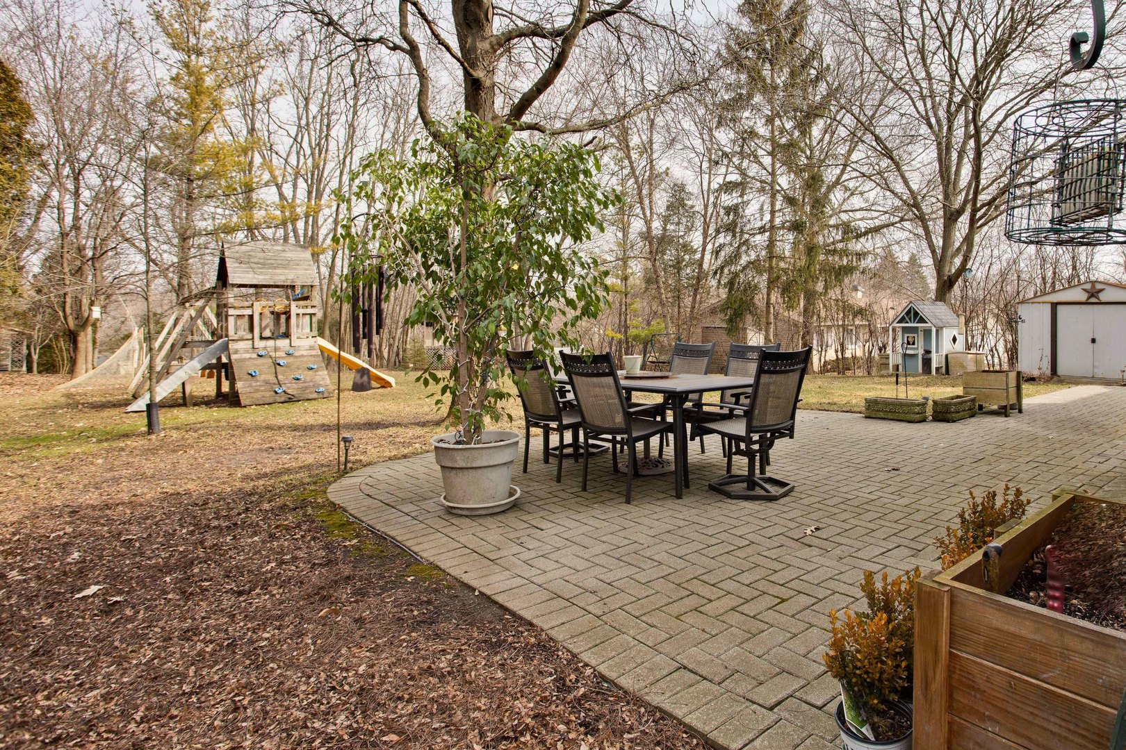 820 Freeman Road Hoffman Estates, IL 60192 - Photo 31 of 33 a view of a yard with a table and chairs