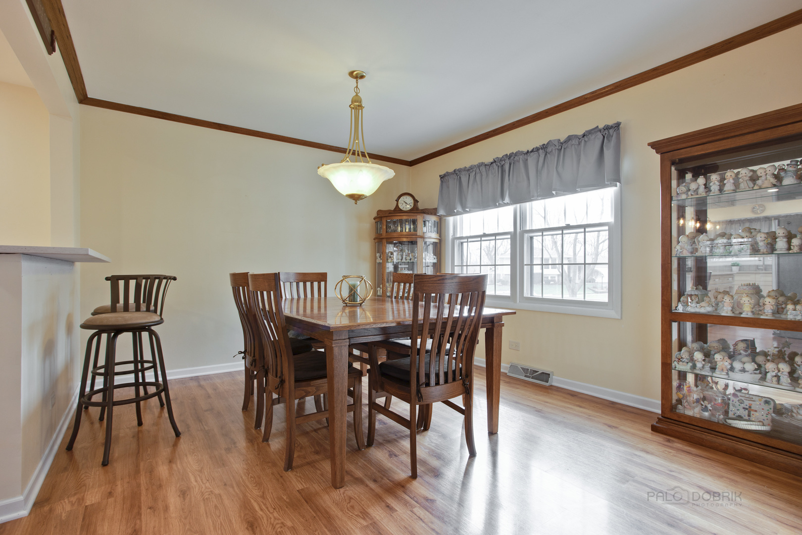 820 Freeman Road Hoffman Estates, IL 60192 - Photo 8 of 33 a view of a dining room with furniture window and wooden floor