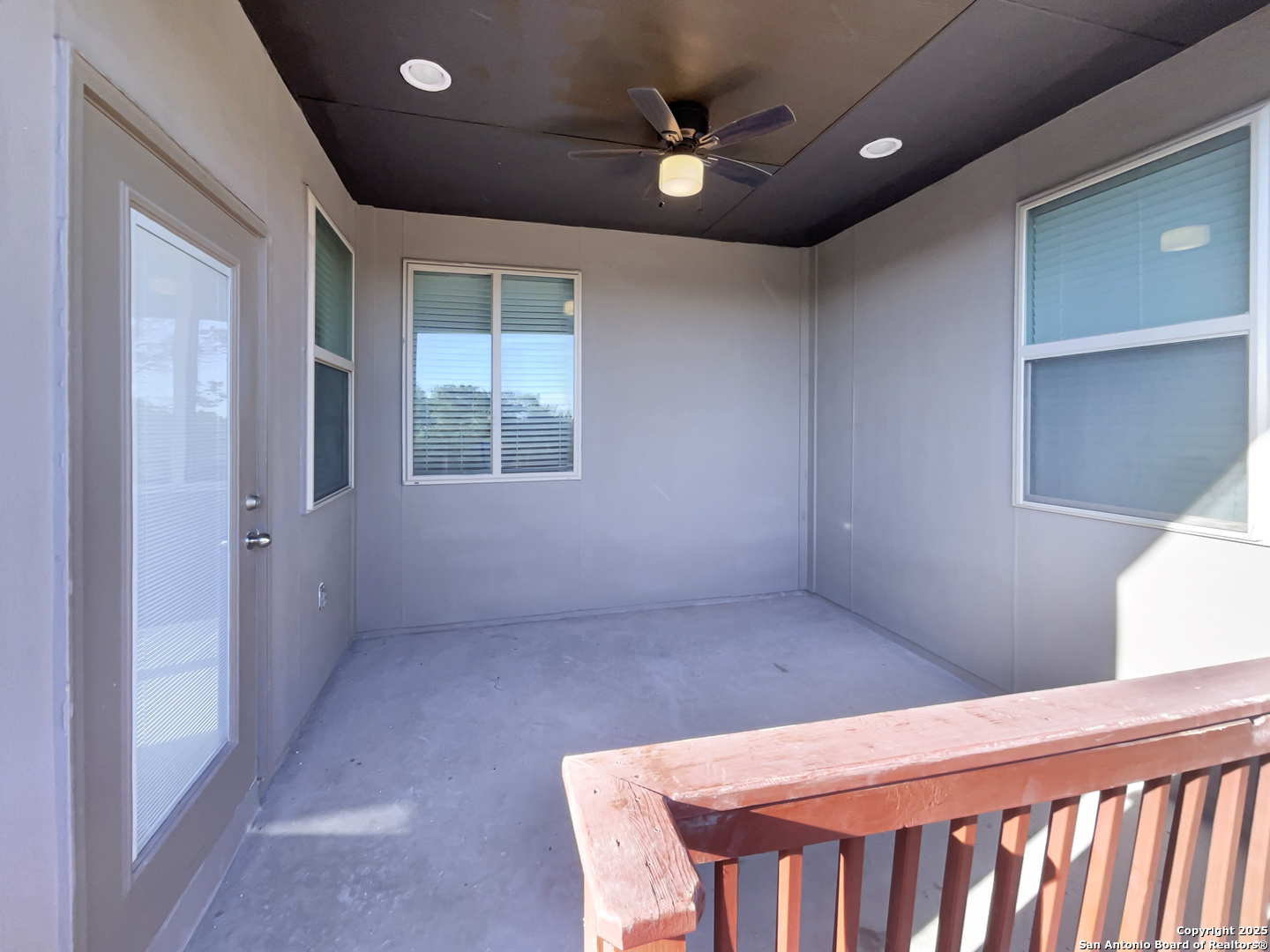 23006 Woodlawn Ridge San Antonio, TX 78259 - Photo 18 of 20 a view of an empty room with a window and a kitchen view