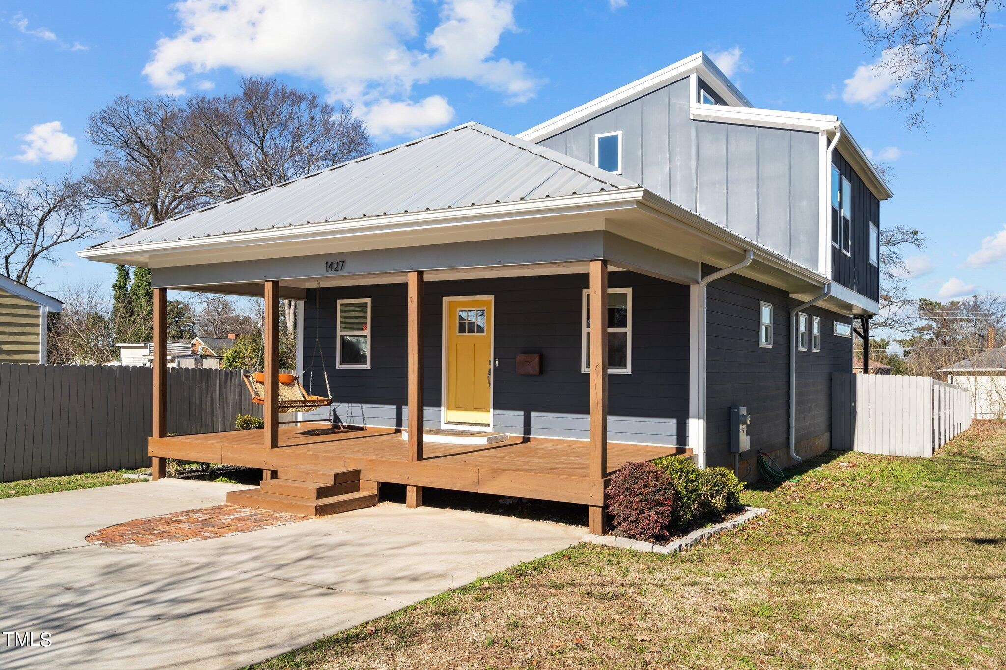 1427 East Lane Street Raleigh, NC 27610 - Photo 2 of 53 Side view