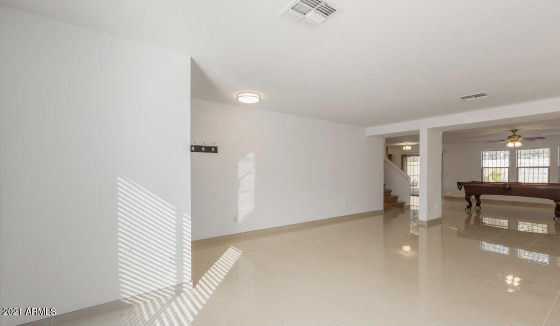 9446 Virginia Avenue Phoenix, AZ 85037 - Photo 2 of 19 wooden floor in a room