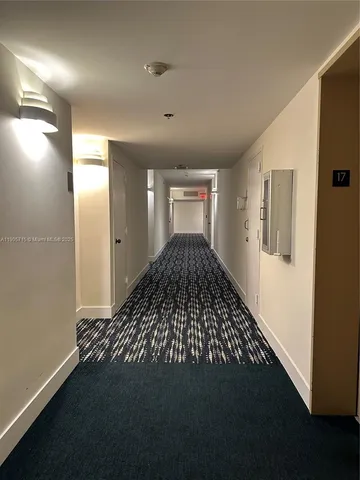 a view of a hallway with entryway