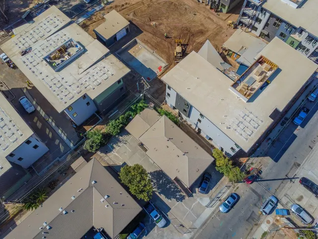 an aerial view of a house with a outdoor space