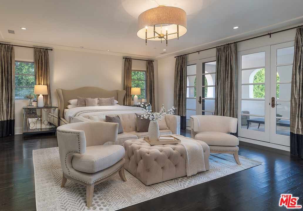 706 North Crescent Drive Beverly Hills, CA 90210 - Photo 23 of 34 a living room with furniture and a large window