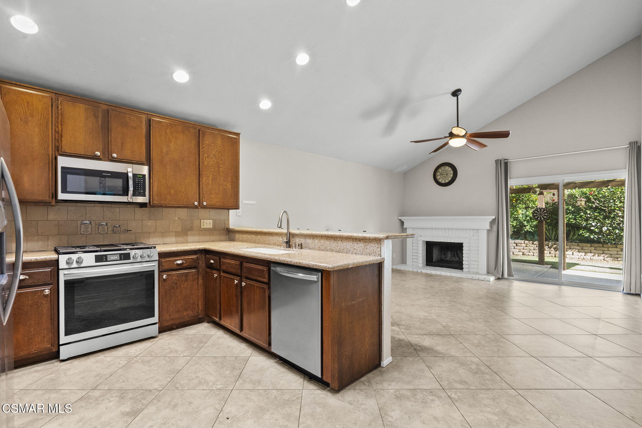 2508 Glenhurst Court Simi Valley, CA 93063 - Photo 15 of 41 a kitchen with a stove and a microwave
