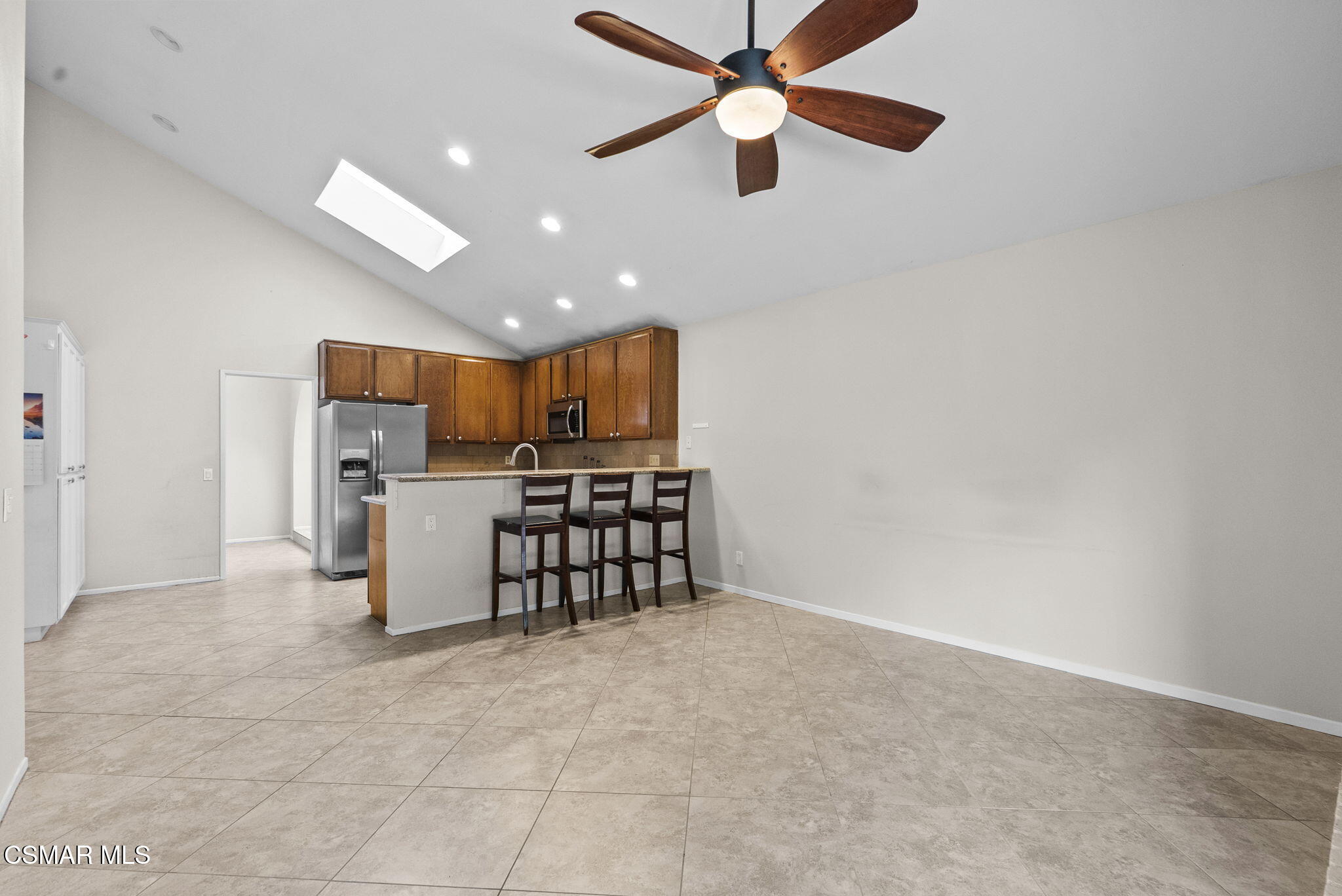 2508 Glenhurst Court Simi Valley, CA 93063 - Photo 18 of 41 a kitchen with stainless steel appliances a refrigerator and microwave