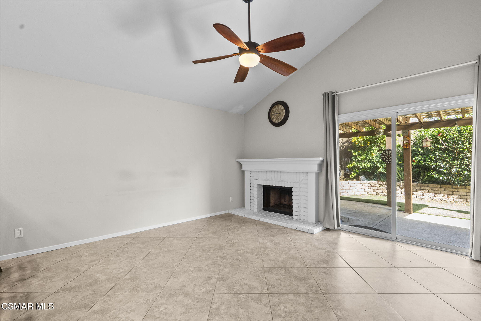 2508 Glenhurst Court Simi Valley, CA 93063 - Photo 20 of 41 a view of an empty room with a fireplace and a large window