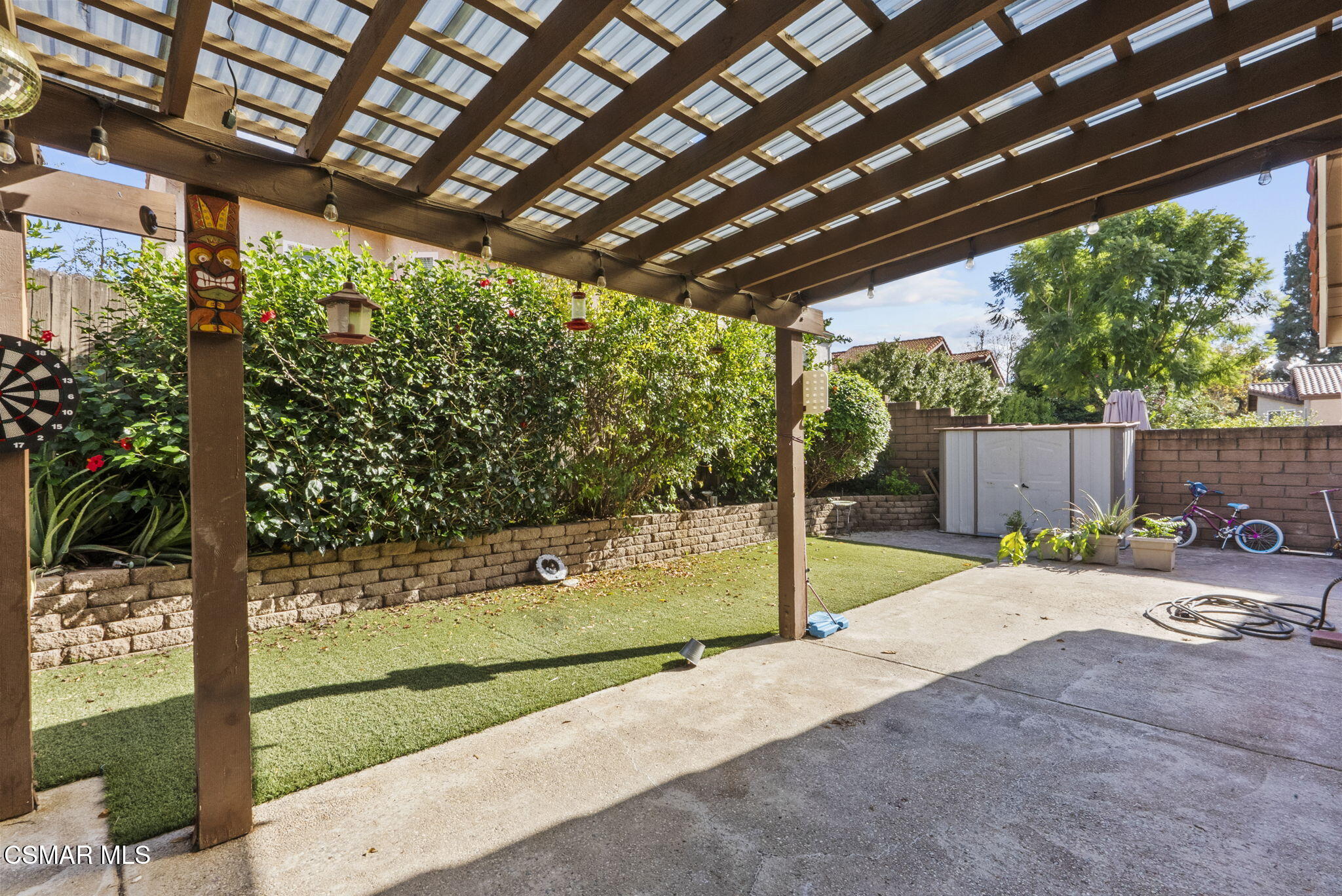 2508 Glenhurst Court Simi Valley, CA 93063 - Photo 32 of 41 a view of a patio with a table and chairs with wooden floor