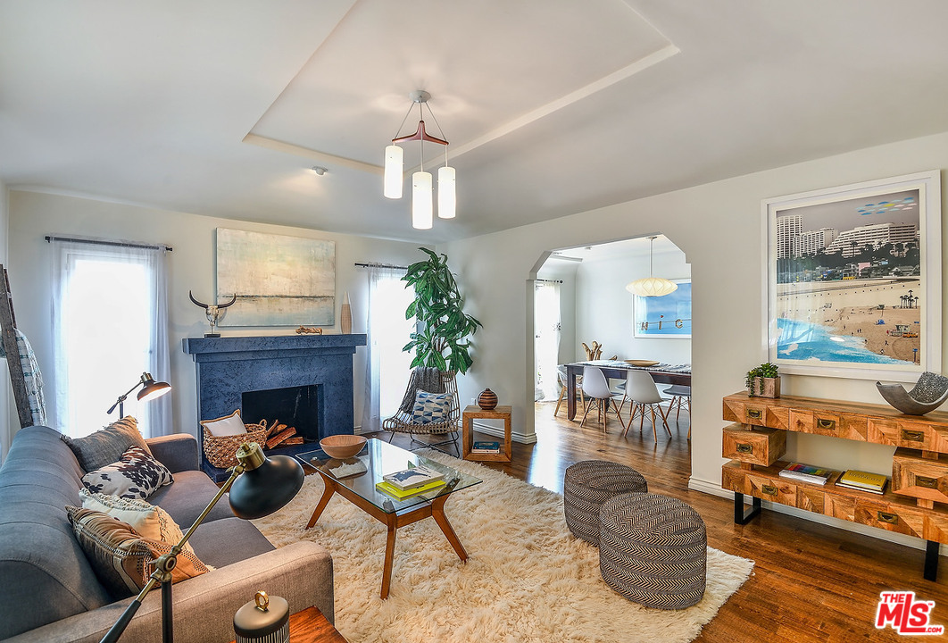 1102 Grant Avenue Venice, CA 90291 - Photo 1 of 29 a living room with furniture fireplace and a table