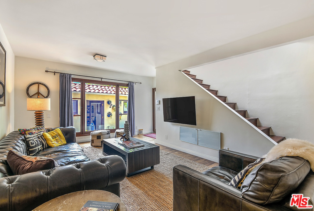 1102 Grant Avenue Venice, CA 90291 - Photo 12 of 29 a living room with furniture and a flat screen tv