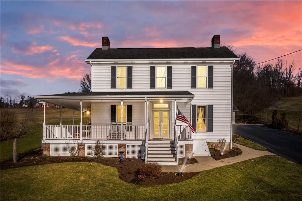 300 McCombs Road Venetia, PA 15367 - Photo 1 of 25 a front view of a house with a yard